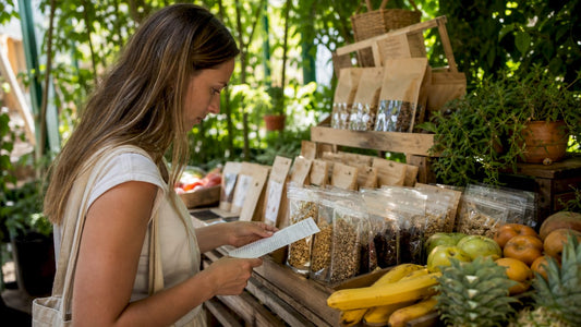 Woman reading label in vegan products aisle