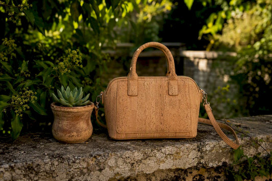Close-up cork handbag on wooden bench
