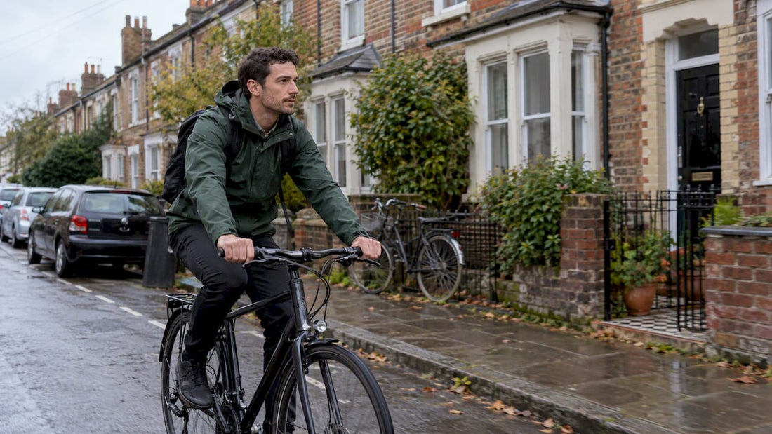 Commuter cycling along a UK residential street